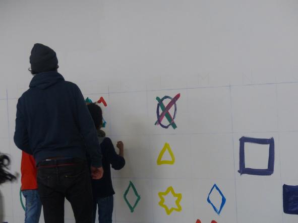 réalisation d'une fresque murale avec le collectif Implémentation